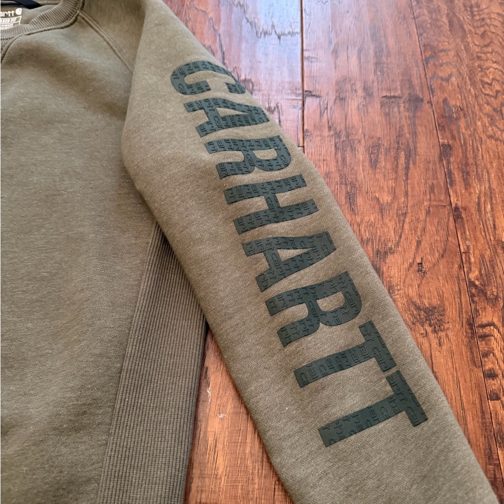 Carhartt Women's Relaxed
Fit Crewneck Logo Olive Sweatshirt - Picture 10 of 15